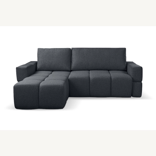 Fumo Komfortowa sofa narożna pikowana Tkanina Neve 97